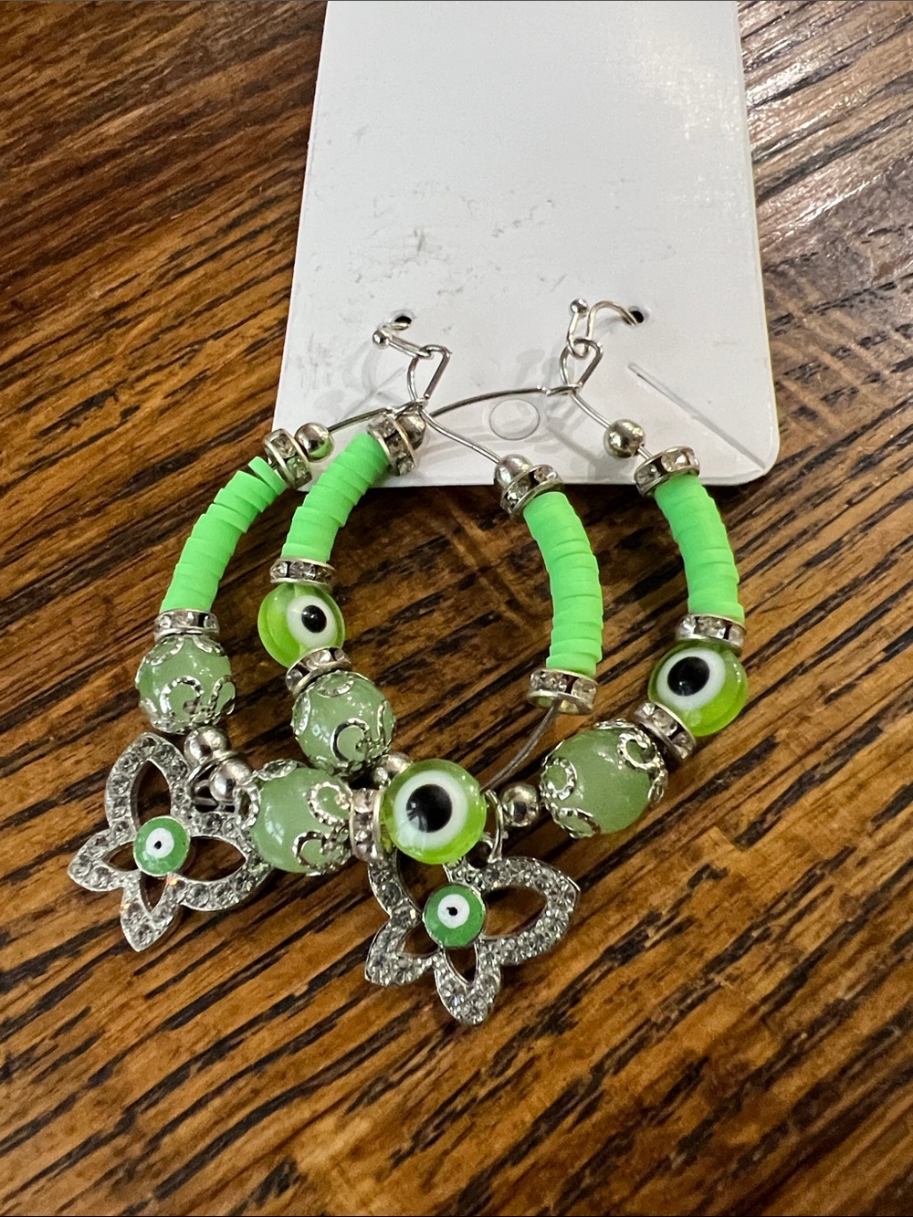 Green Beaded Evil Eye Hoop Earrings with Butterfly Charm